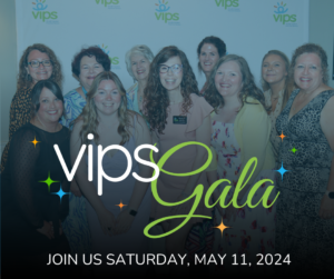 A group of women stand together smiling--the VIPS Gala logo is on the image, too.