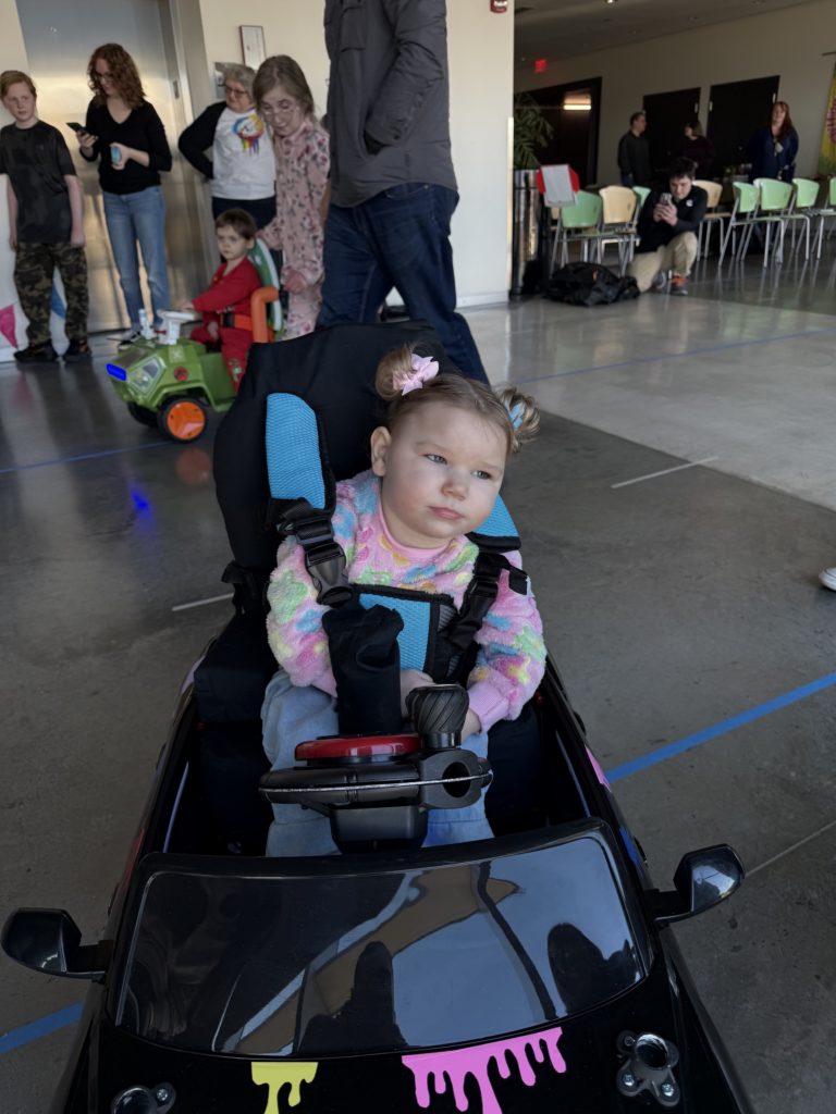 Brynn sitting in her car