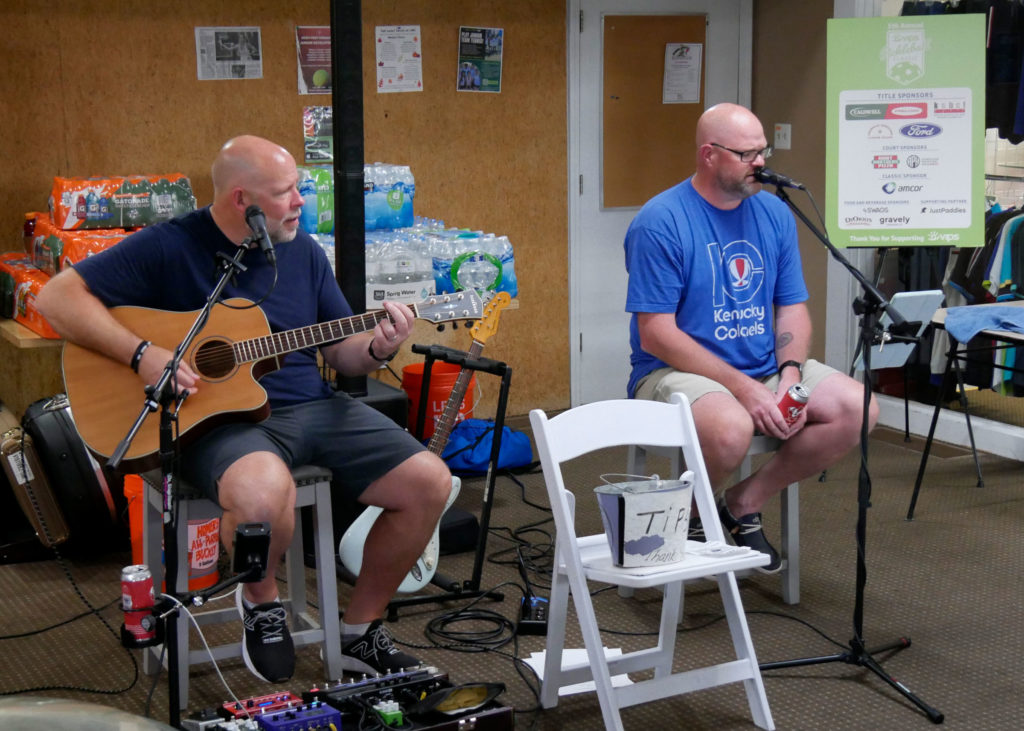 Brandon Halfacre (left), guitar and Allen Haywood (right), vocals, perform during the Friday night welcome party.