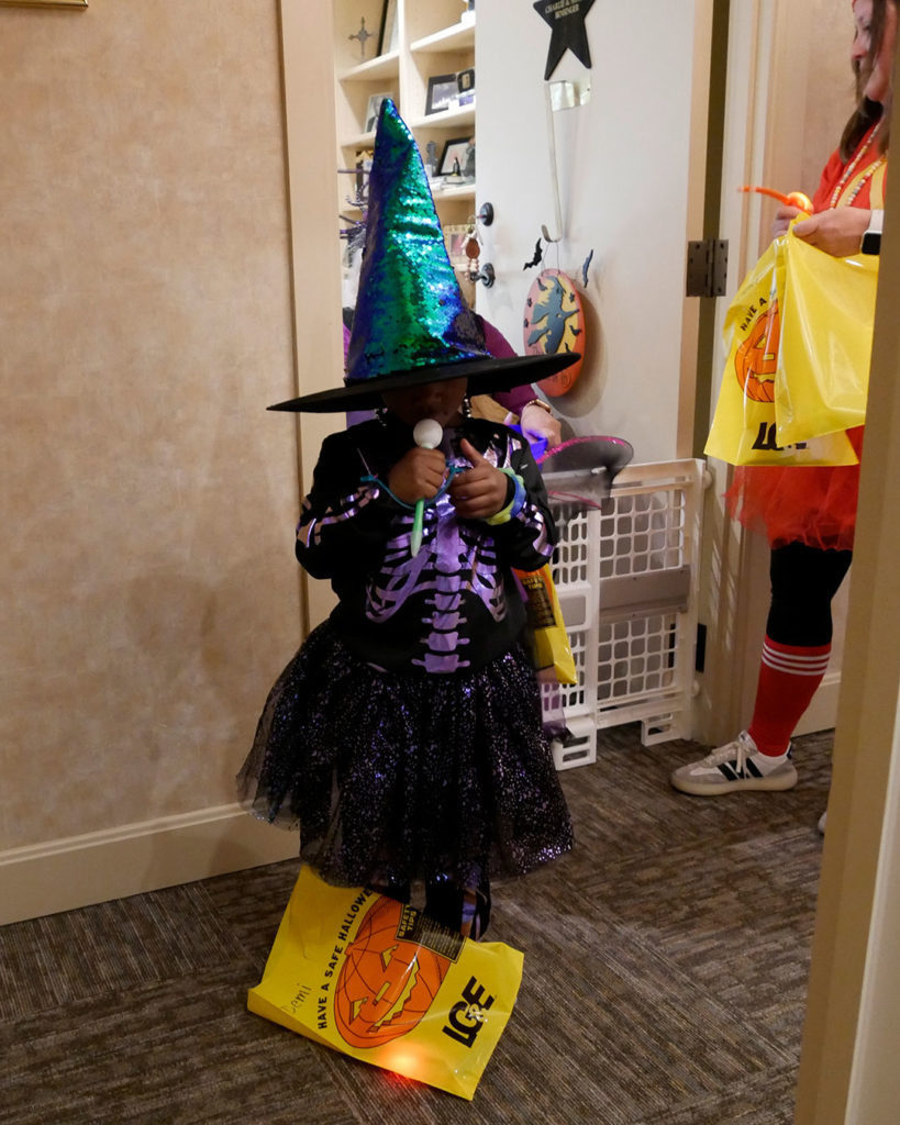 A witch takes a closer look at her new eyeball pen.