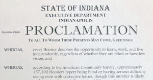 A photo of the official proclamation that October is Blindness and Low Vision Awareness Month in Indiana, signed by Governor Mike Braun.