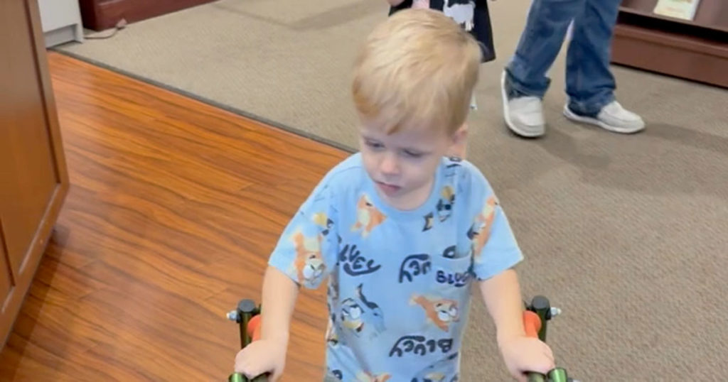 Screenshot from video of Jaxton using his walker.