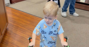 Screenshot from video of Jaxton using his walker.
