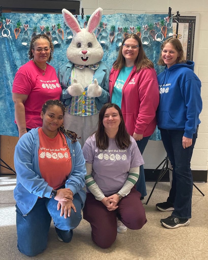 Clovernook staff members pose for a photo with the Easter Bunny.