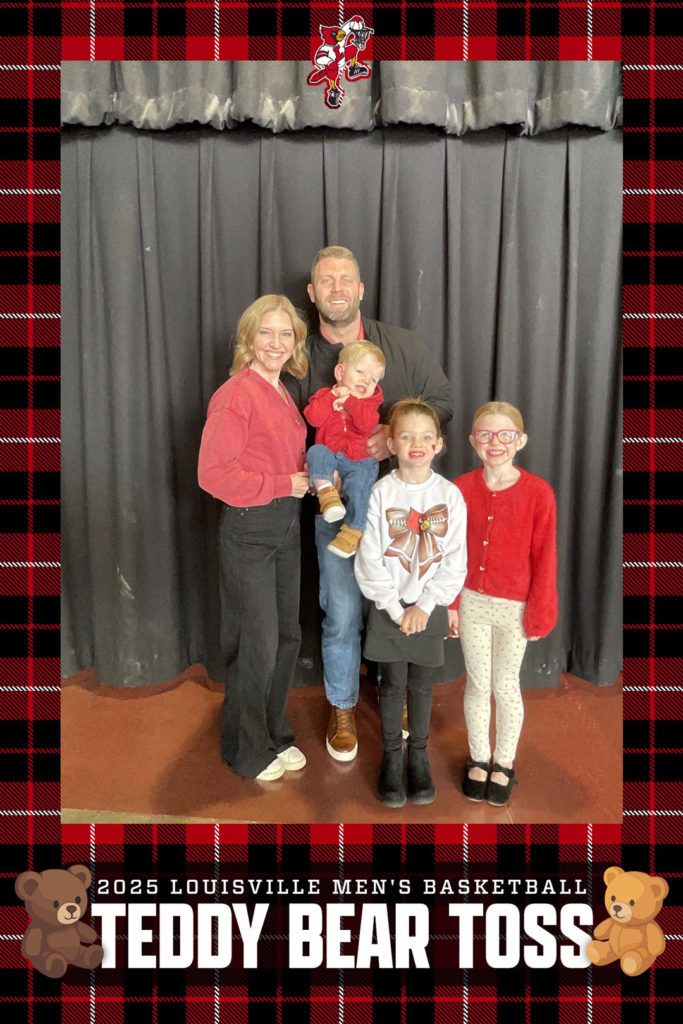 Wells and his family pose for a photo at the 2025 Louisville Men's Basketball Teddy Bear Toss.