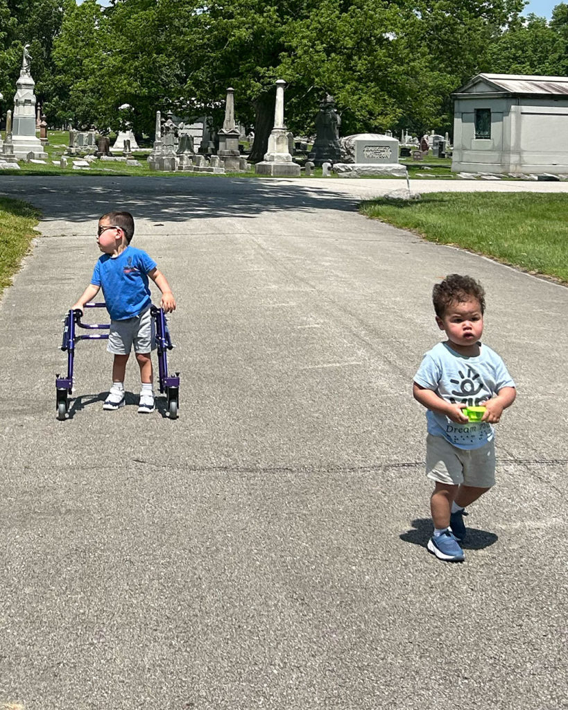 Two small boys supporting VIPS during Walking for Dreams.