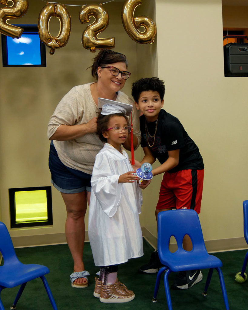 A famiy poses for a photo after the ceremony.